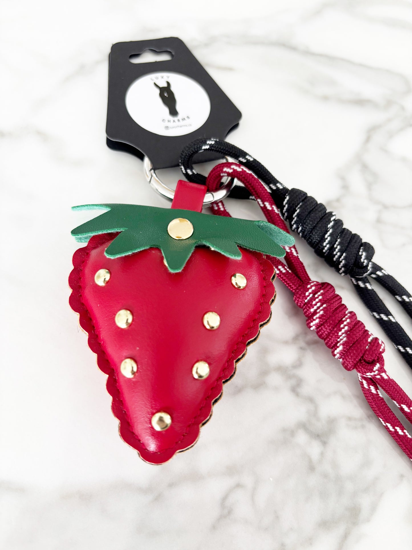 Red Strawberry Fields bag charm