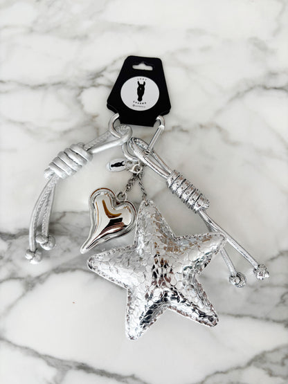 The Silver Stardust Charm