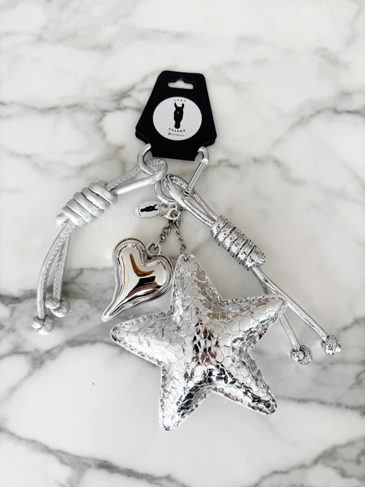 The Silver Stardust Charm